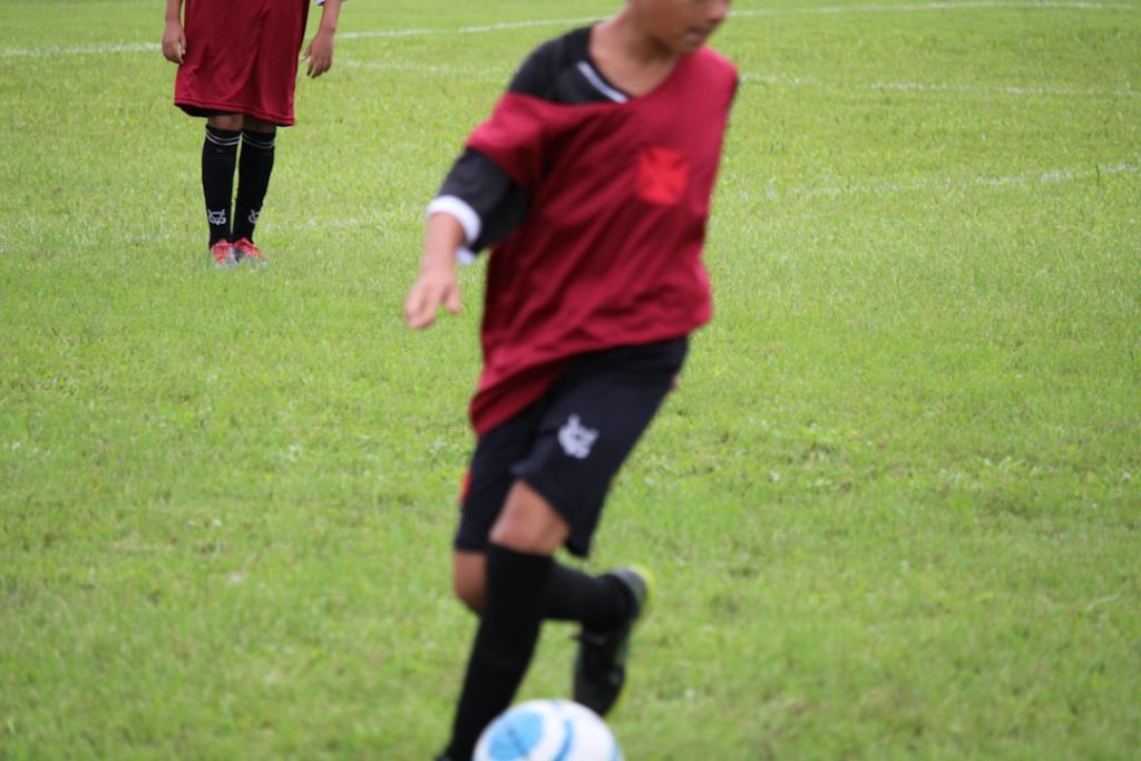a group of young men playing a game of soccer soccer training coach player