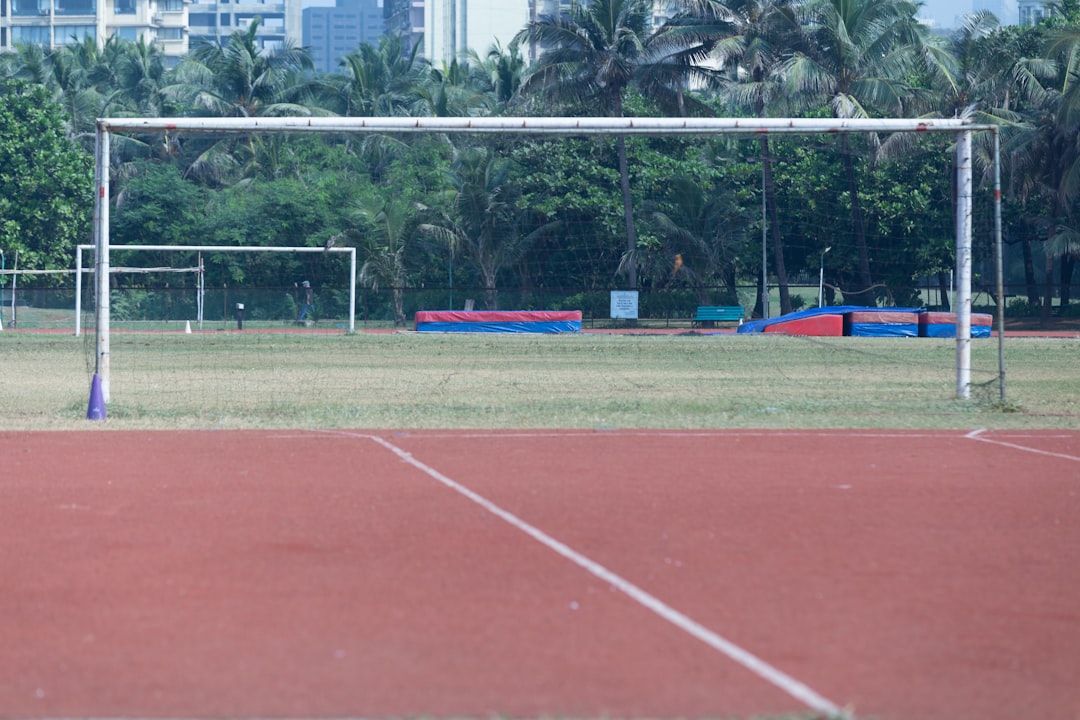 a soccer field with a goal in the middle of it soccer training coach player