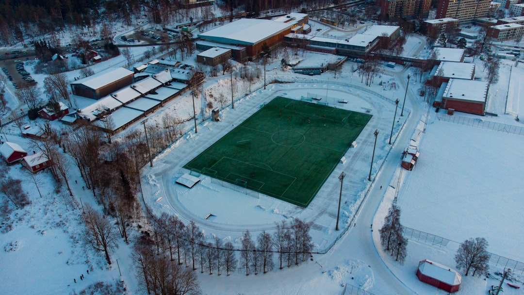 aerial view of basketball court snow, soccer, winter