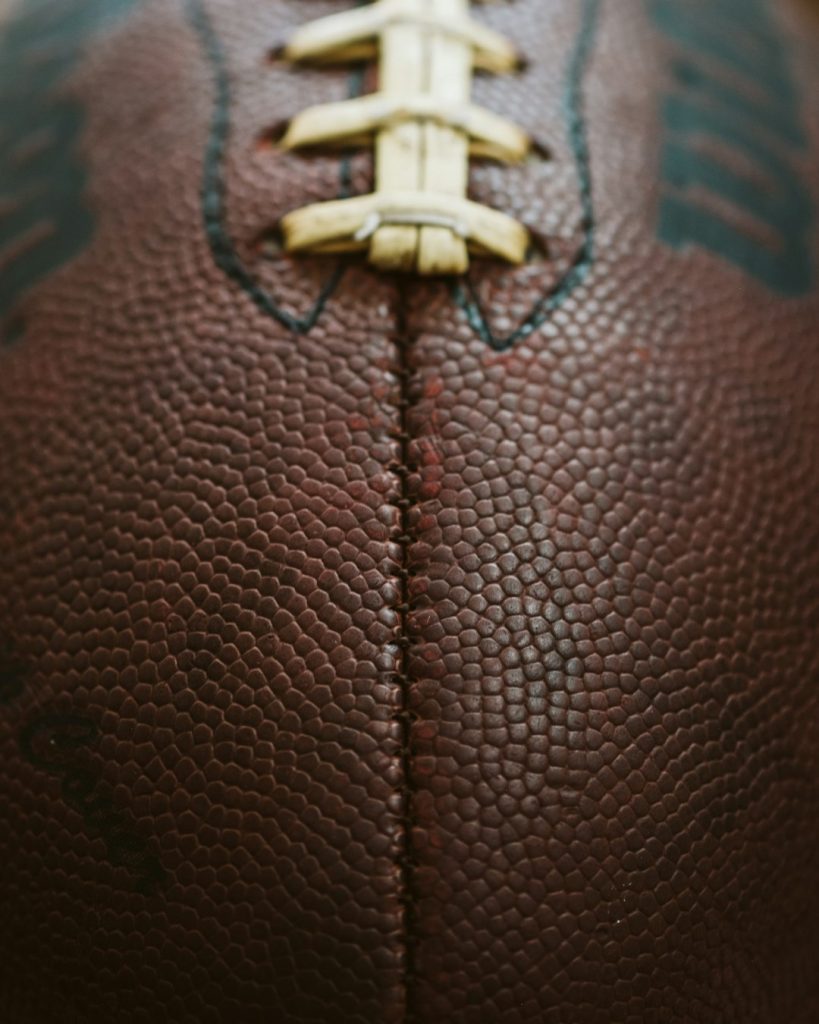 brown rugby ball quarterback, football pass, hail mary
