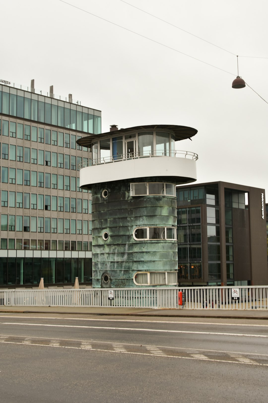 A tall building sitting on the side of a road espn, bristol, headquarters