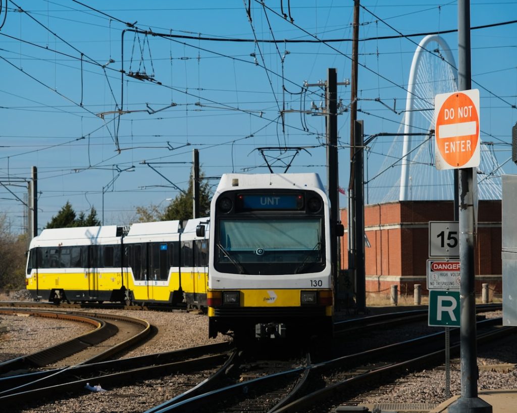a train on the railway tracks dak prescott, dallas cowboys, quarterback throwing