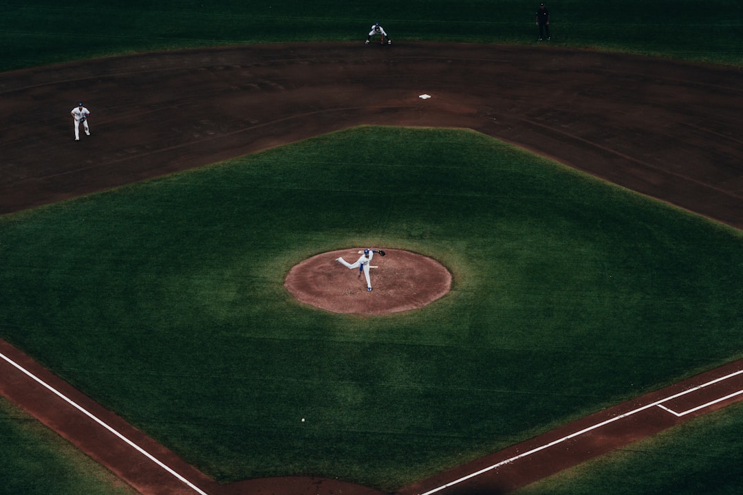 brown and green football field baseball pitcher throw stadium