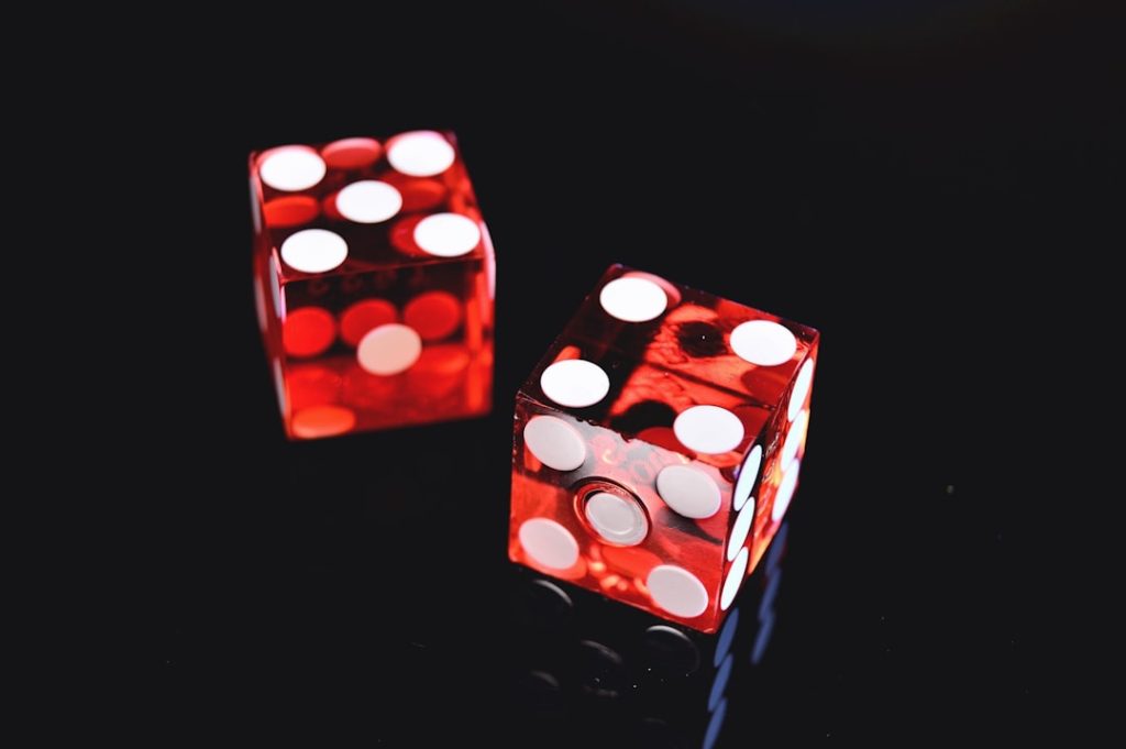 two red and white dices basketball players game shot