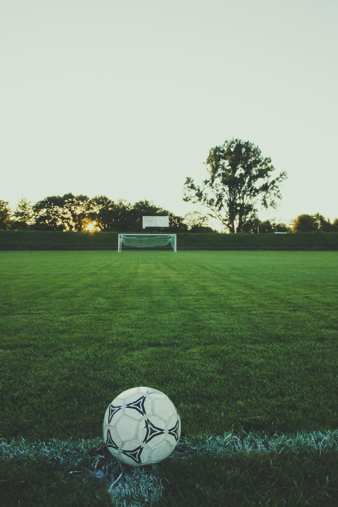 white and black soccer ball defense, tackle, football players