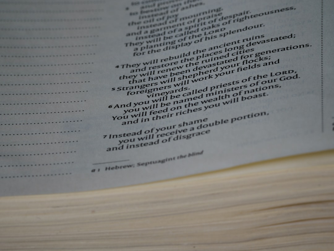 a close up of a book with a poem on it gavel, copyright law, legal documents