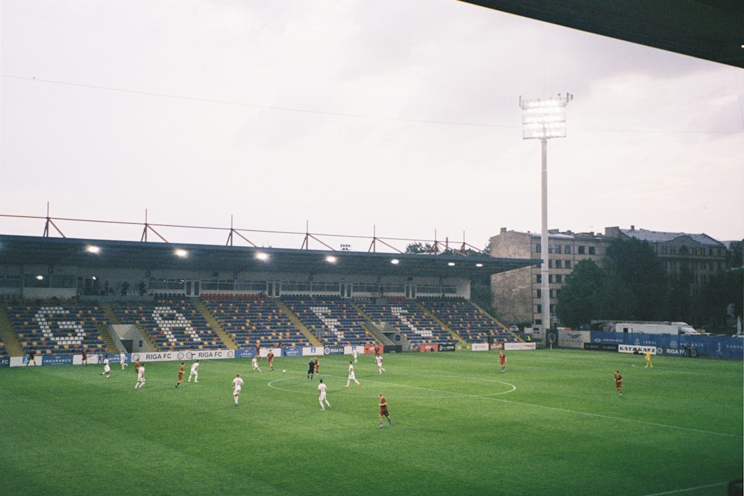 a group of people playing football fc copenhagen stadium, brondby fans, danish football match