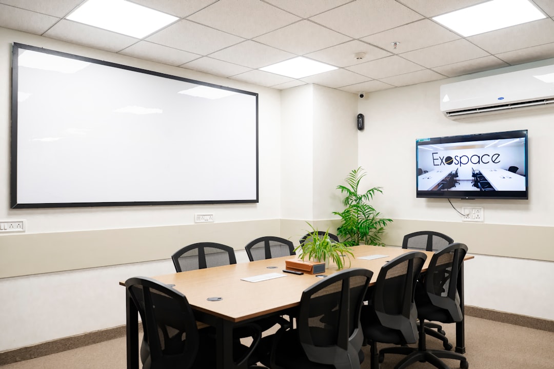 A meeting room is ready for discussions. client meeting, crm dashboard, commercial buildings