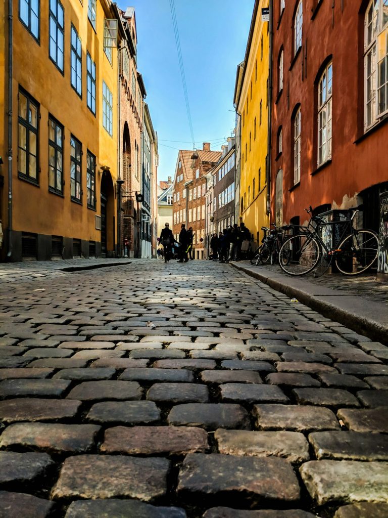 low angle view photography of street and parked bikes fc copenhagen stadium, brondby fans, danish football match