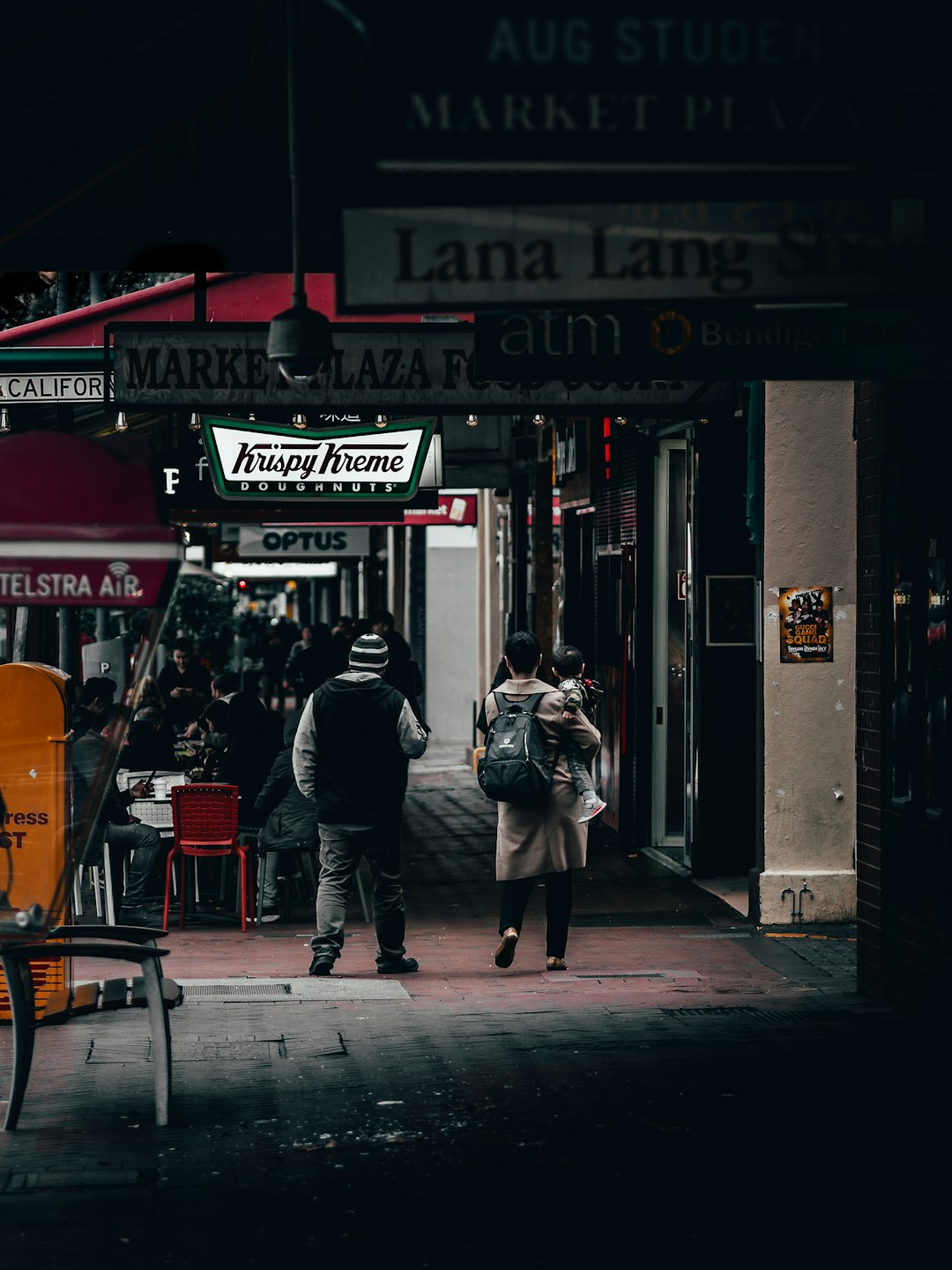 person standing in front of Krispy Kreme store shopping online, customer service, discounts