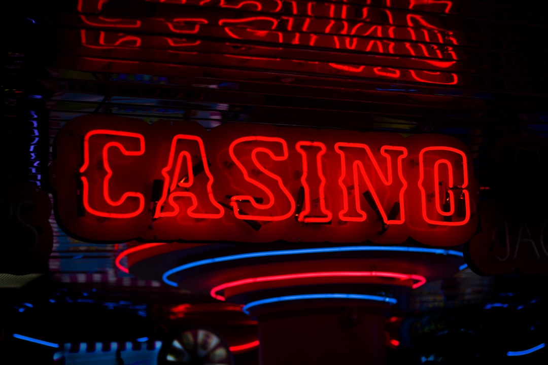 red Casino neon sign turned on casino bonuses, promotions, slot spins