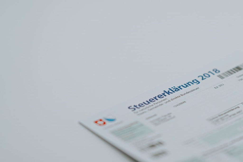 a close up of a ticket on a table business card, recruitment, networking event