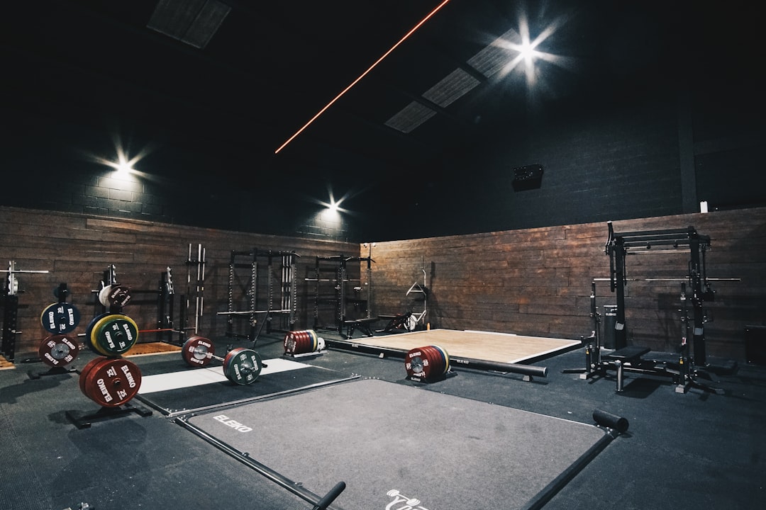 a gym with a lot of equipment in it home gym, low budget, small space