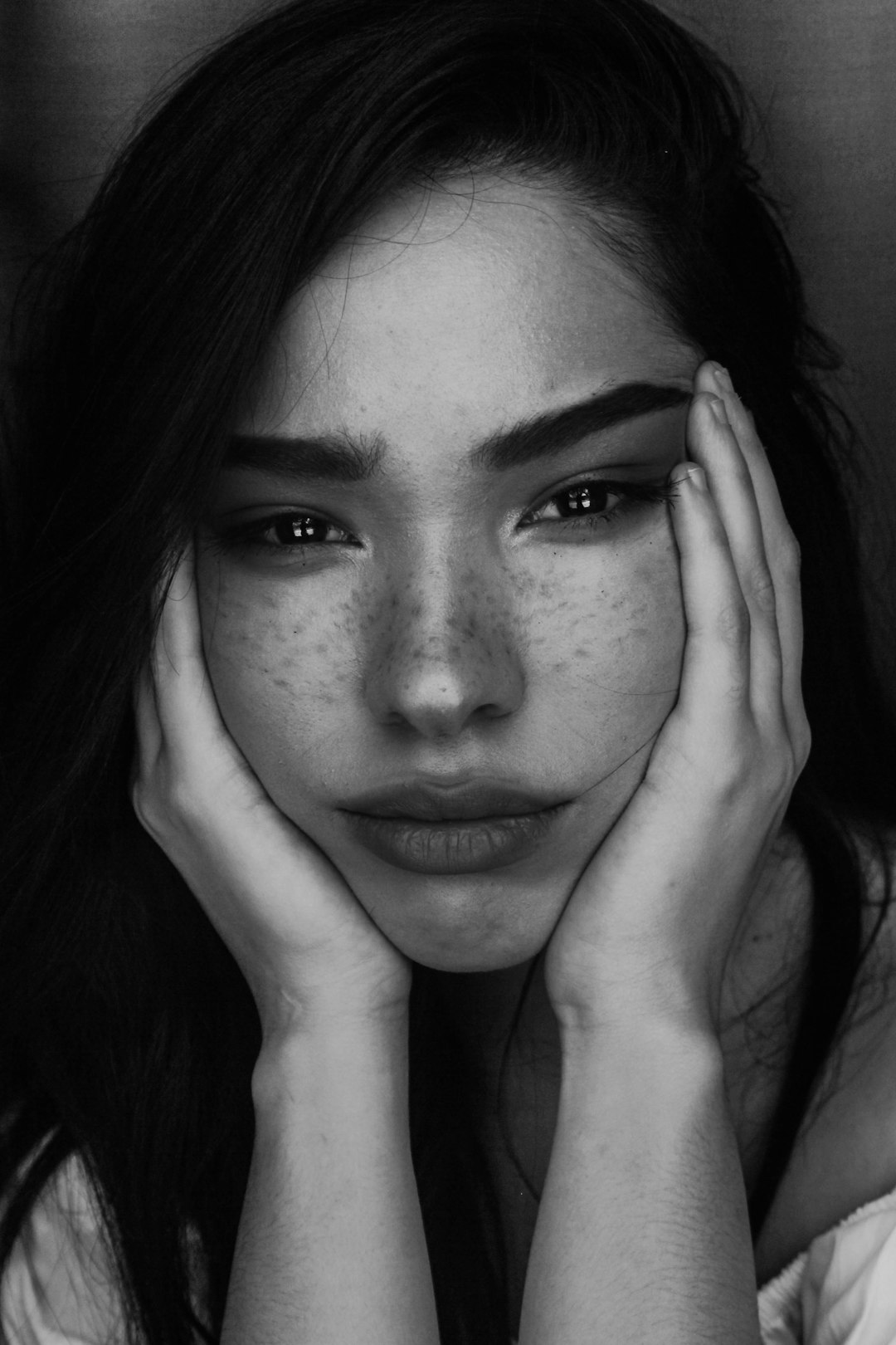 grayscale photography of woman with two hands on her face nba 2k face scan, mobile facial recognition, basketball avatar