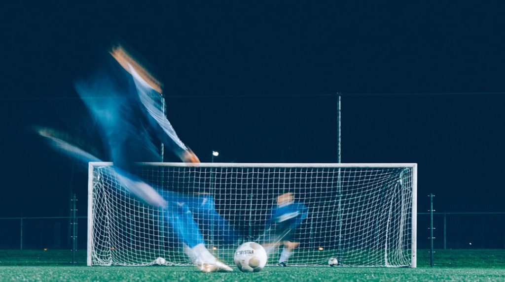 timelapse photo of soccer player kicking ball defensive tackle, tampa bay, powerhouse, nfl football