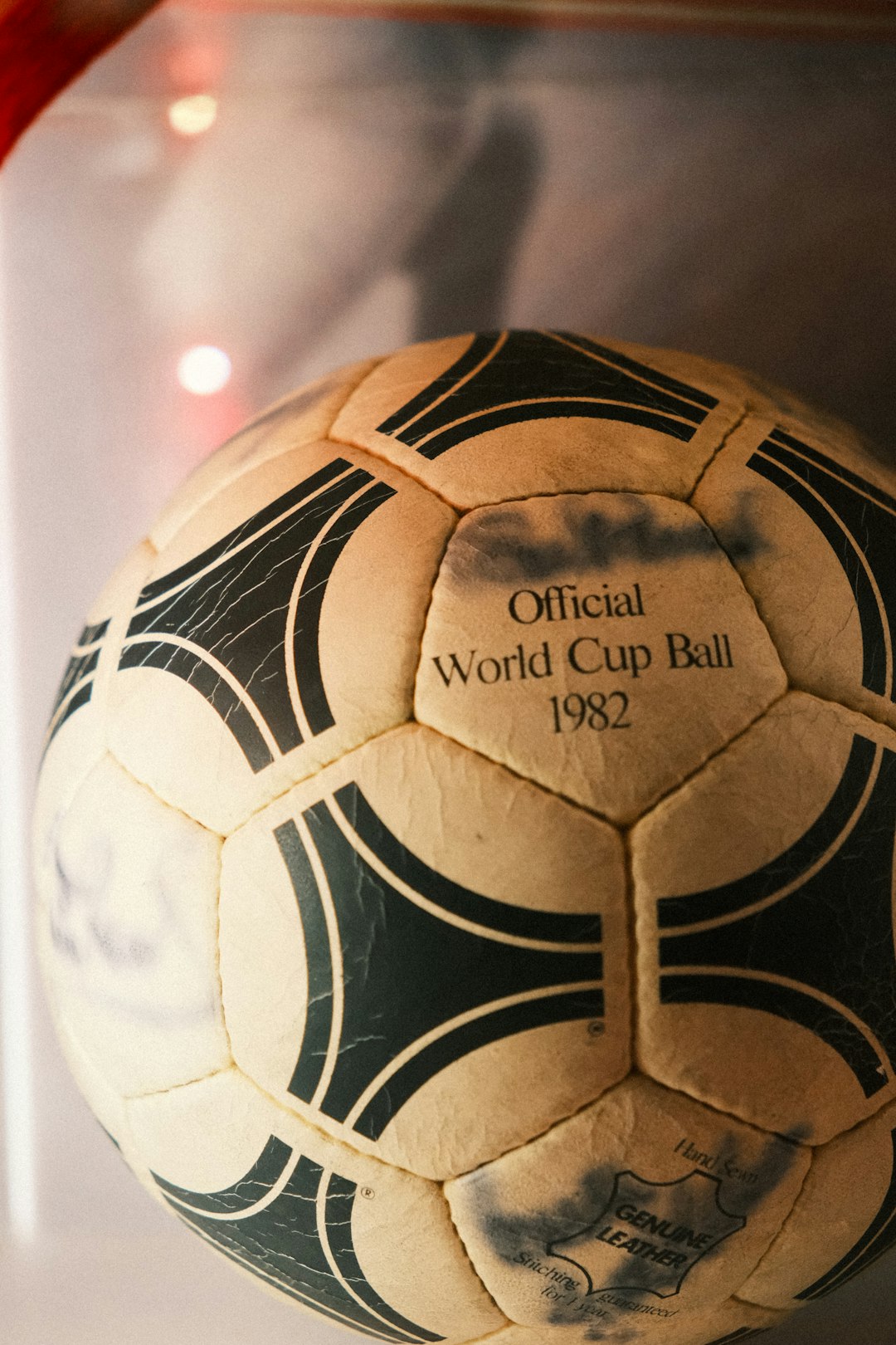 A close up of a soccer ball in a case personalized football gift, sports memorabilia, engraved football