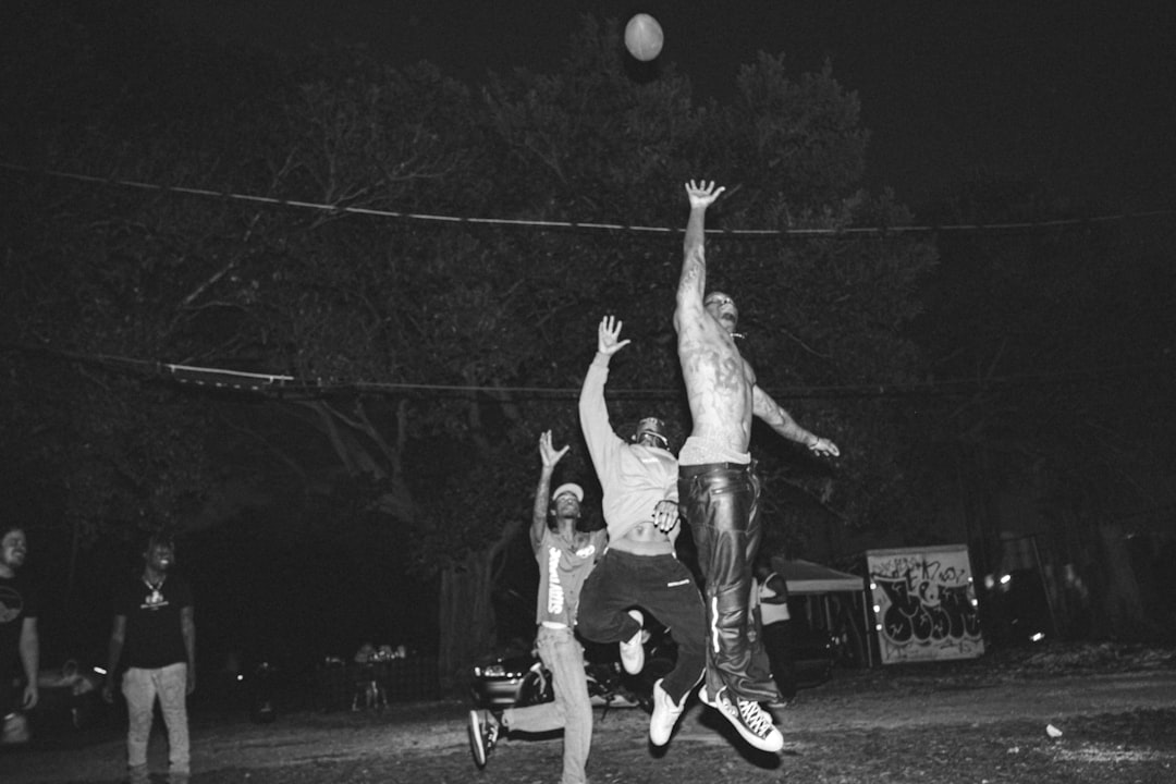 a group of men playing a game of frisbee willis reed, knicks vs lakers, 1970 nba finals, madison square garden