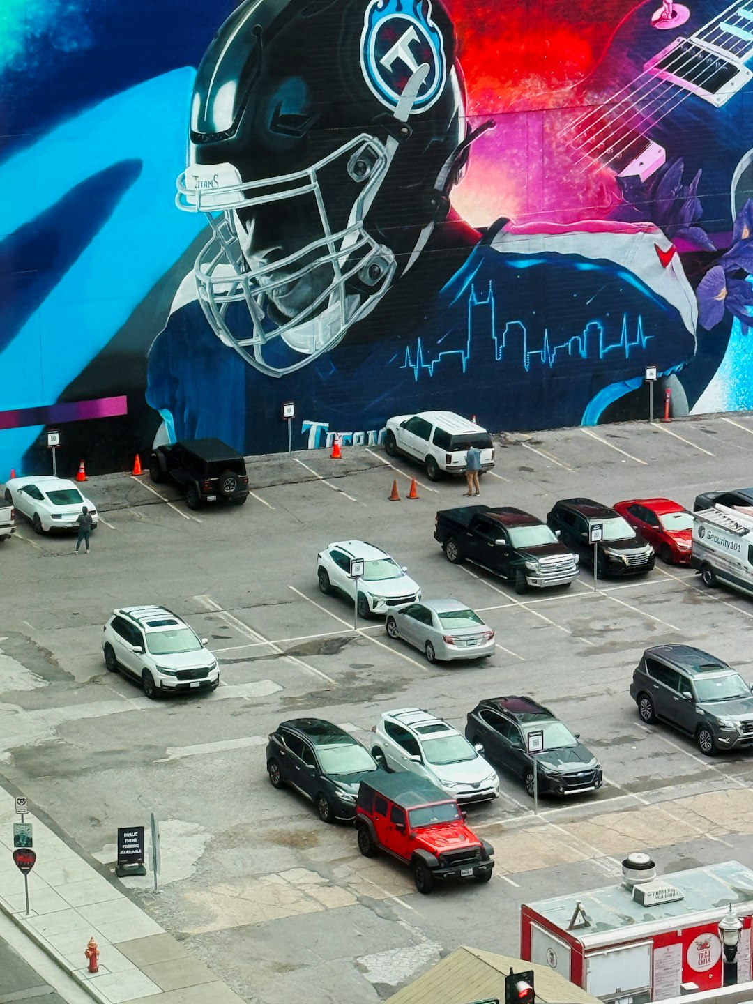 A large mural of a football player on the side of a building miami dolphins, chad pennington, nfl comeback