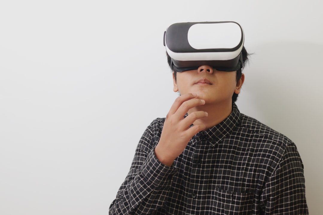 a man wearing a virtual reality headset virtual reality, online gambling, future tech