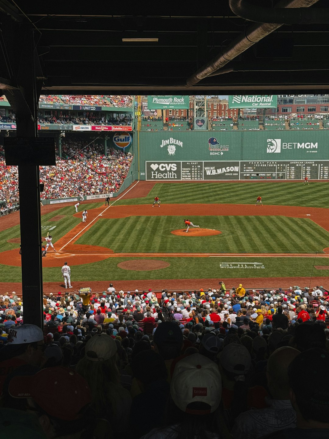 Baseball game in progress with spectators watching. college baseball, mlb the show 25, stadiums
