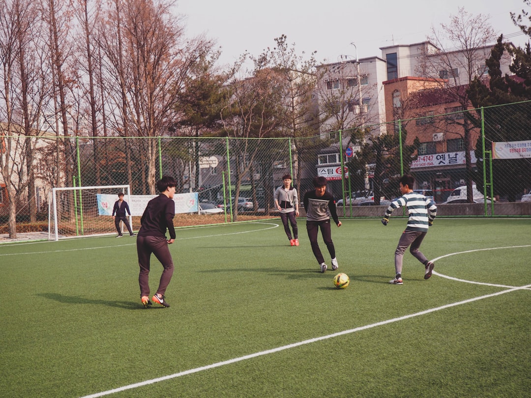 boys playing soccer on field soccer rondo, youth players, practice session