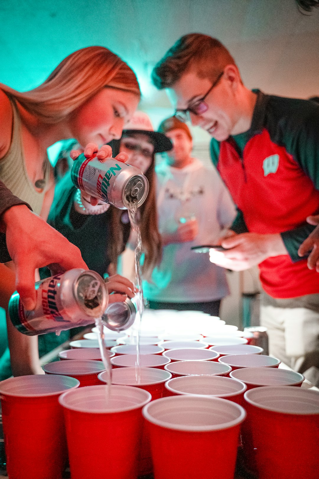 man in red polo shirt pouring wine on clear wine glass college baseball, mlb the show 25, stadiums