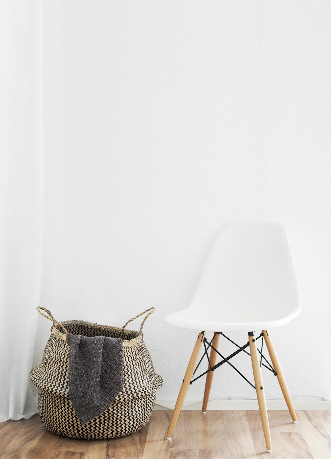 white and brown chairs beside wicker basket near white wall nfl draft war room, scouting reports, draft board