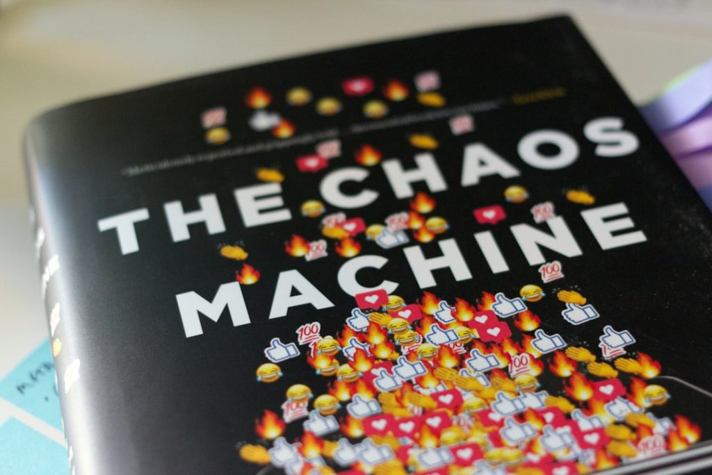 a book about the chaos machine on a table data science, machine learning, charts