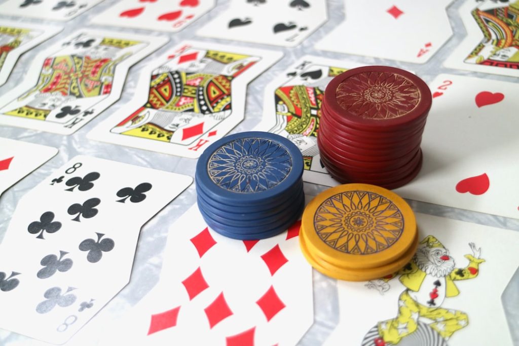 a group of colorful bowls on a table usa map, gambling laws, state age limits