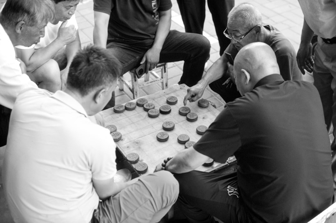 a group of men playing a game of chess team training, agility drills, cones