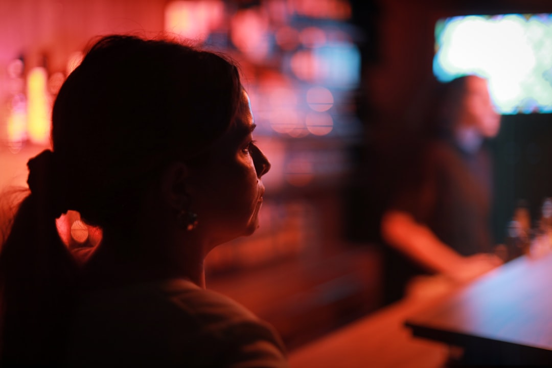 a man sitting at a table usa map, sports betting laws, legalization