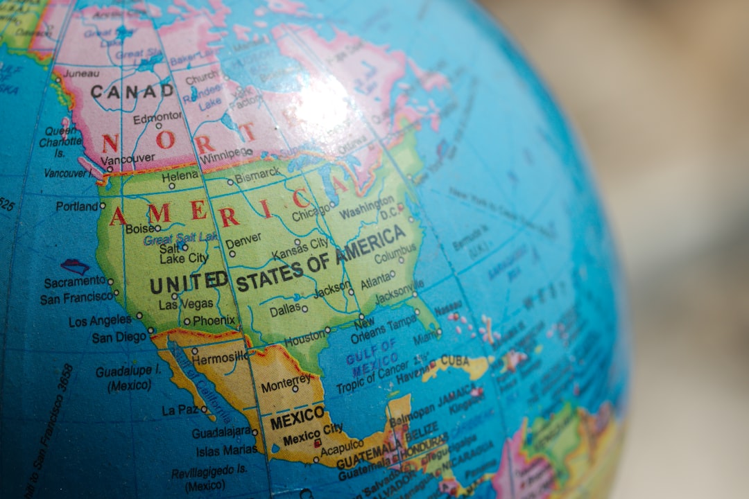 blue and brown desk globe usa map, sports betting laws, legalization