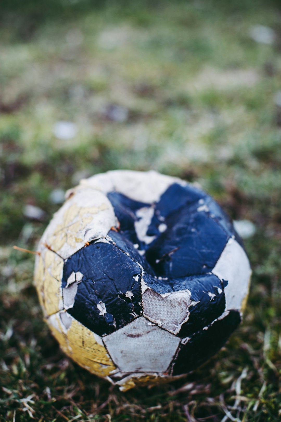 white and blue soccer ball on green grass field soccer rabona, free kick, balance