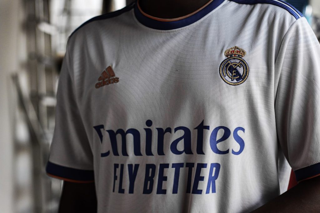 a close up of a soccer jersey on a person real madrid, real sociedad, santiago bernabeu, la liga