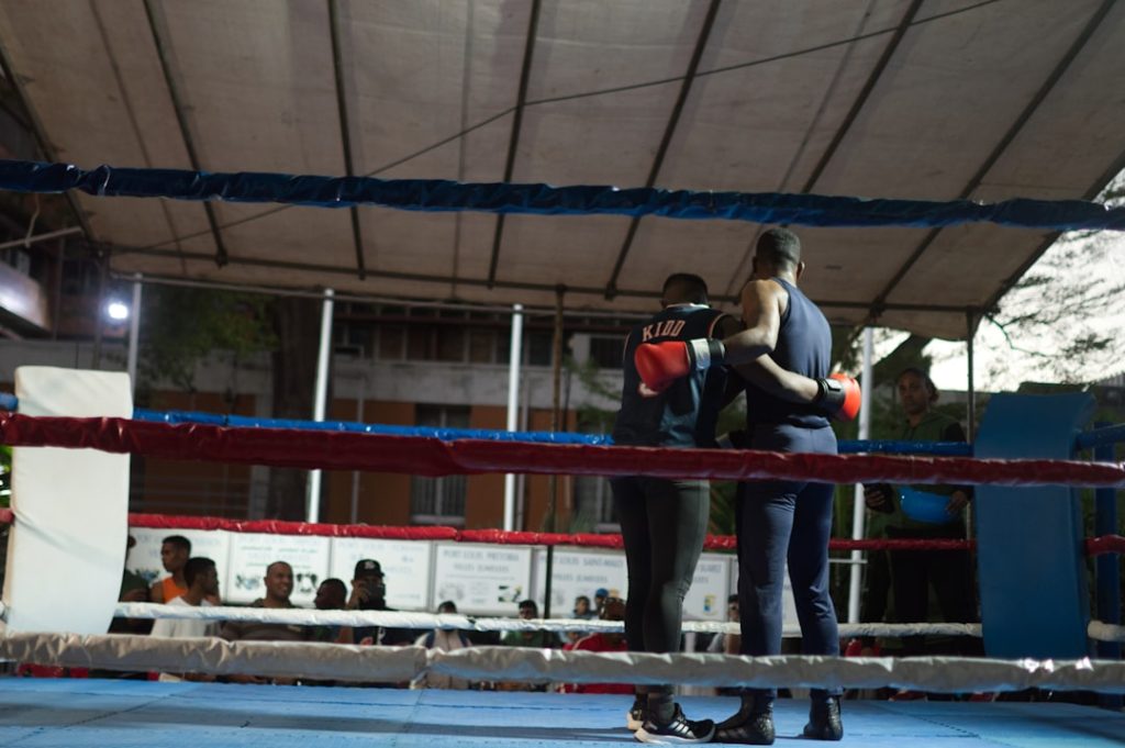 A man standing on top of a boxing ring chisora, parker, boxing match