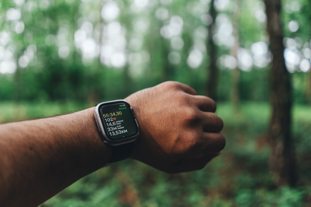 a man's arm with a smart watch on it smartwatch app, runner stats, heart rate graph