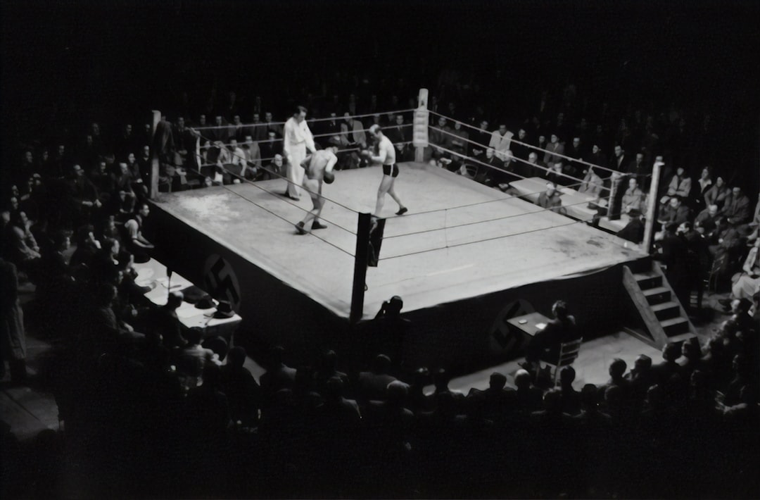 grayscale photo of boxing game chisora, parker, boxing match