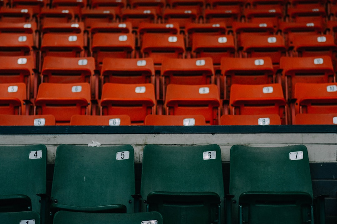 green and orange theatre chairs Josh Rosen, Arizona Cardinals, dejected