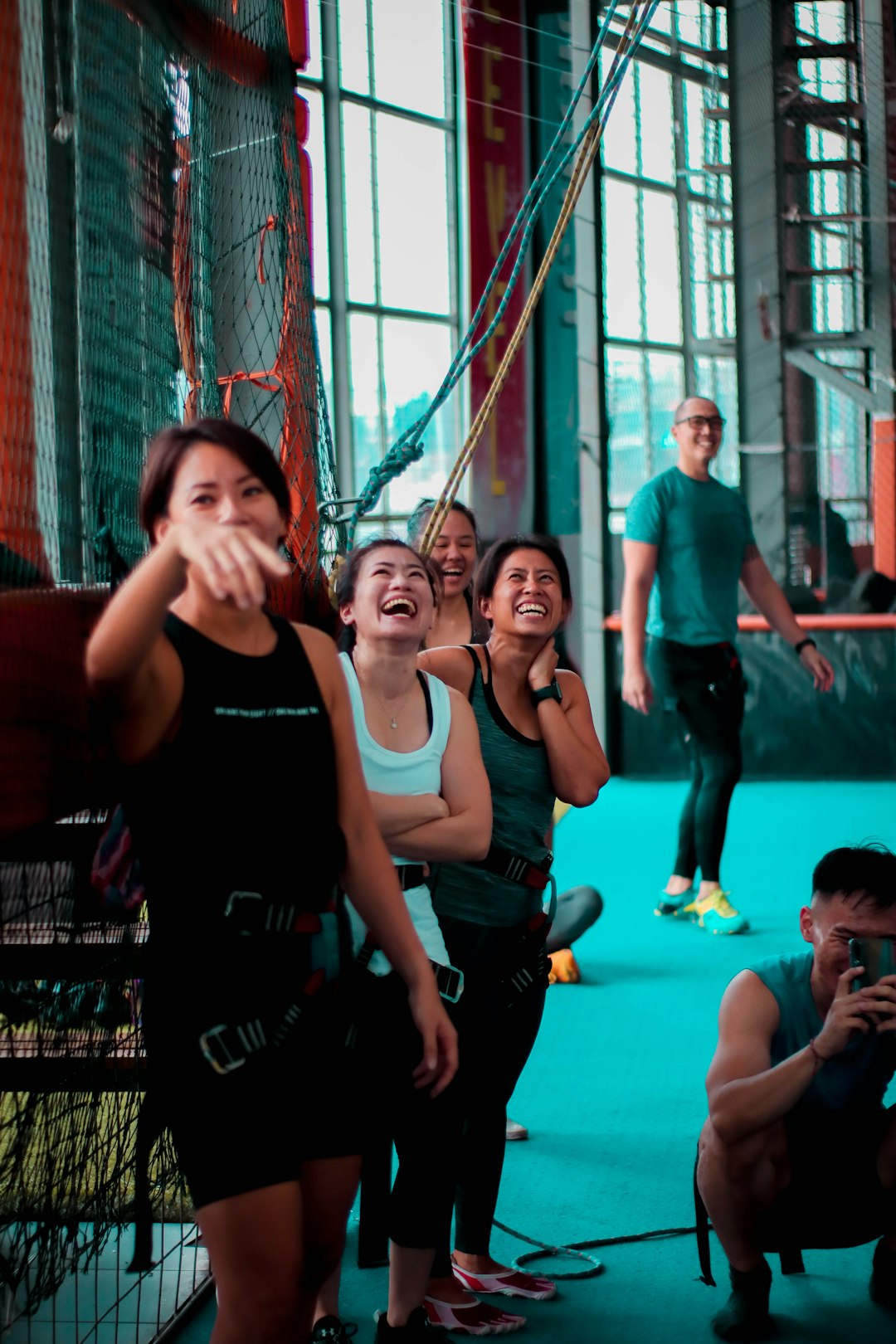 man in black tank top fitness community, wearable tech, group challenge