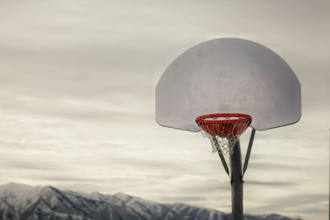 white and red basketball hoop naia basketball player, tournament mvp, college of idaho hero