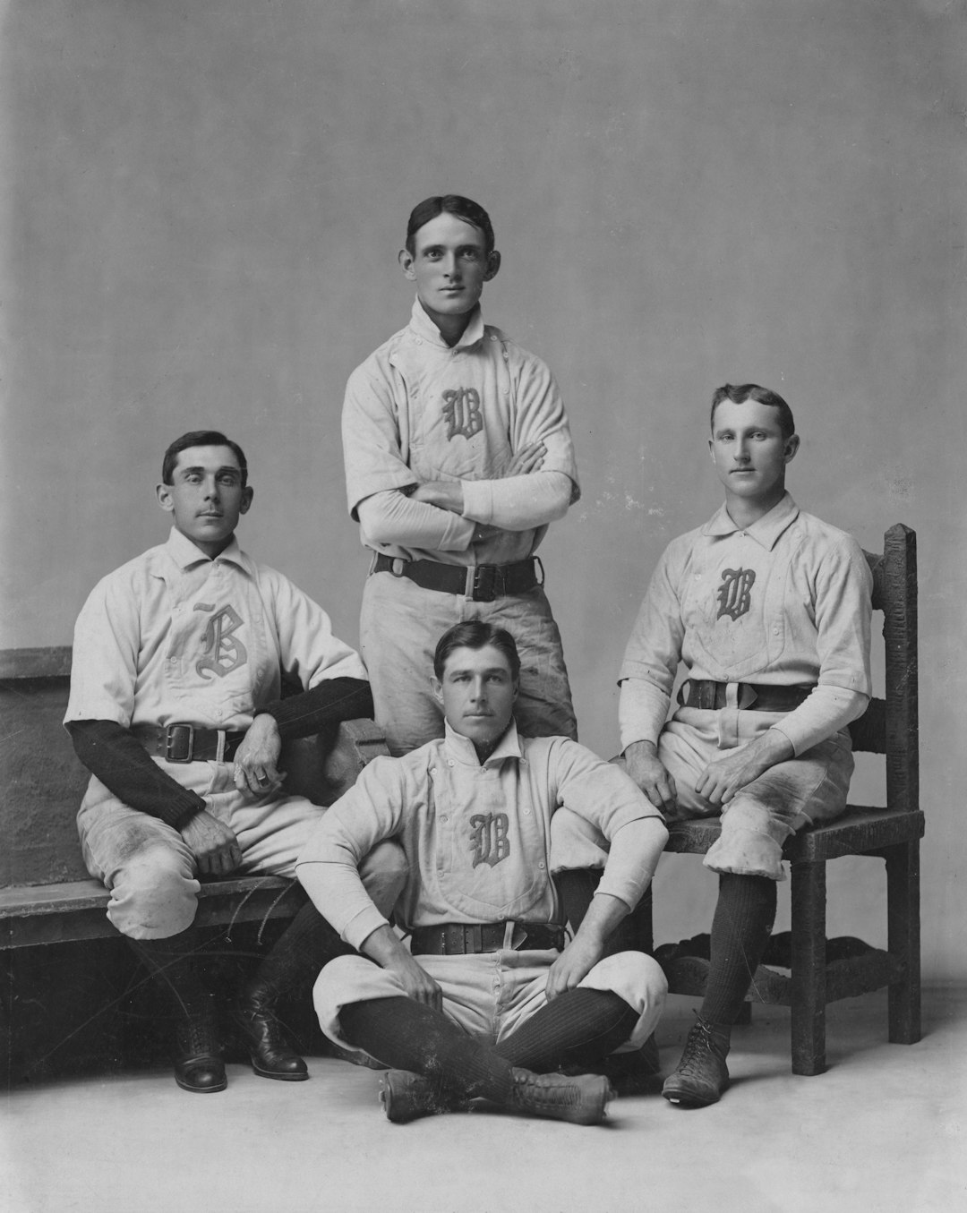 a black and white photo of a baseball team cincinnati red stockings, 1869 baseball team, early baseball uniforms