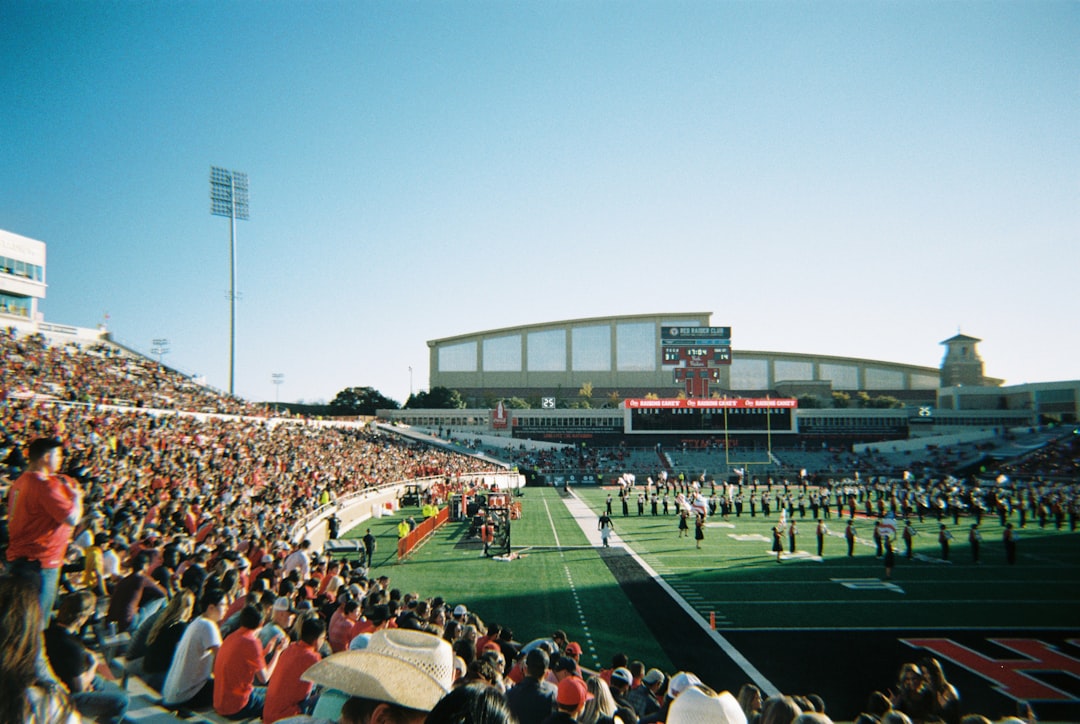 a football stadium with a crowd of people quarterbacks preseason action stadium