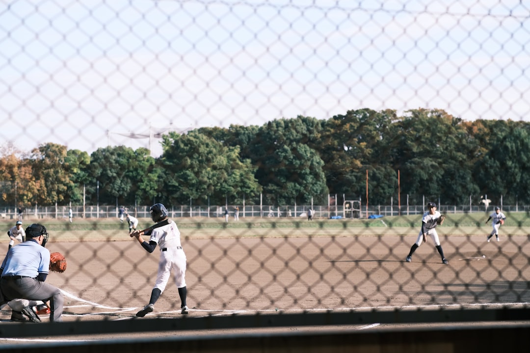 A group of baseball players playing a game of baseball softbank hawks, japan baseball, championship team