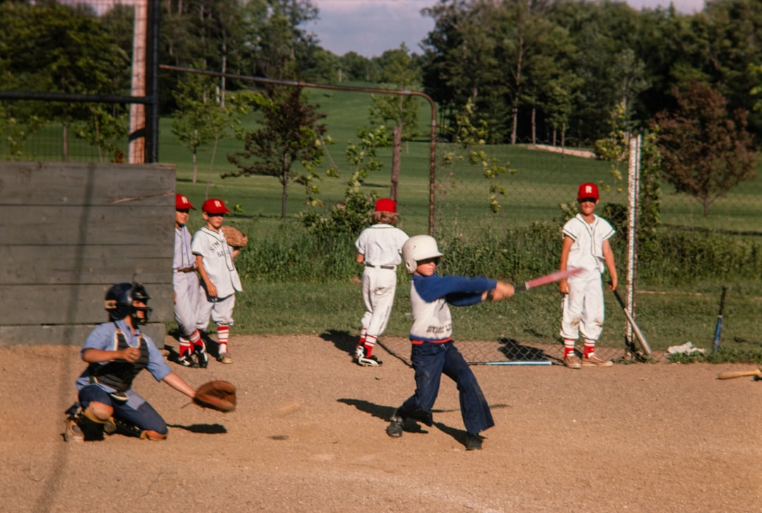 a group of young men playing a game of baseball batter pitcher hot zone chart baseball
