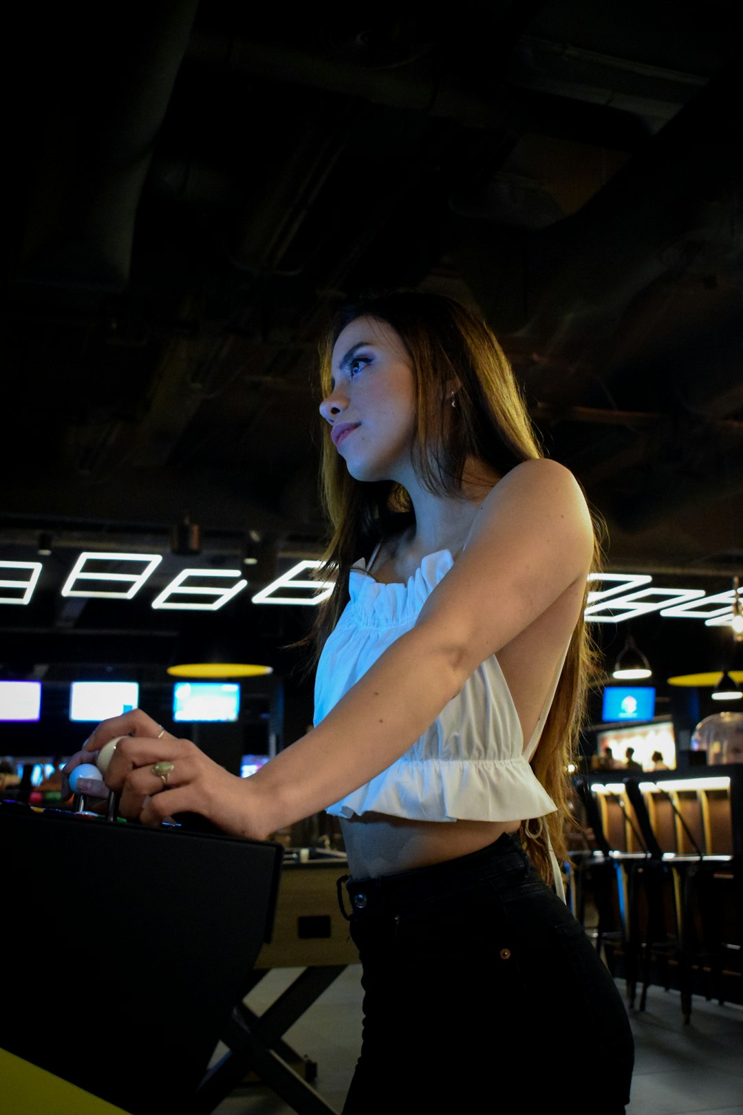 a person with the hands in the pockets sports betting professional, sharp bettor, laptop with betting analysis
