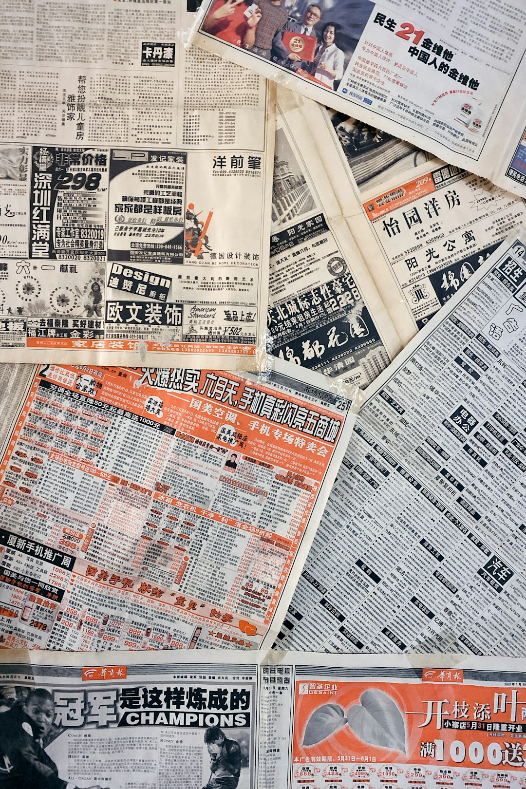 a pile of newspapers sitting on top of each other odds comparison, sports betting apps, multiple sportsbooks