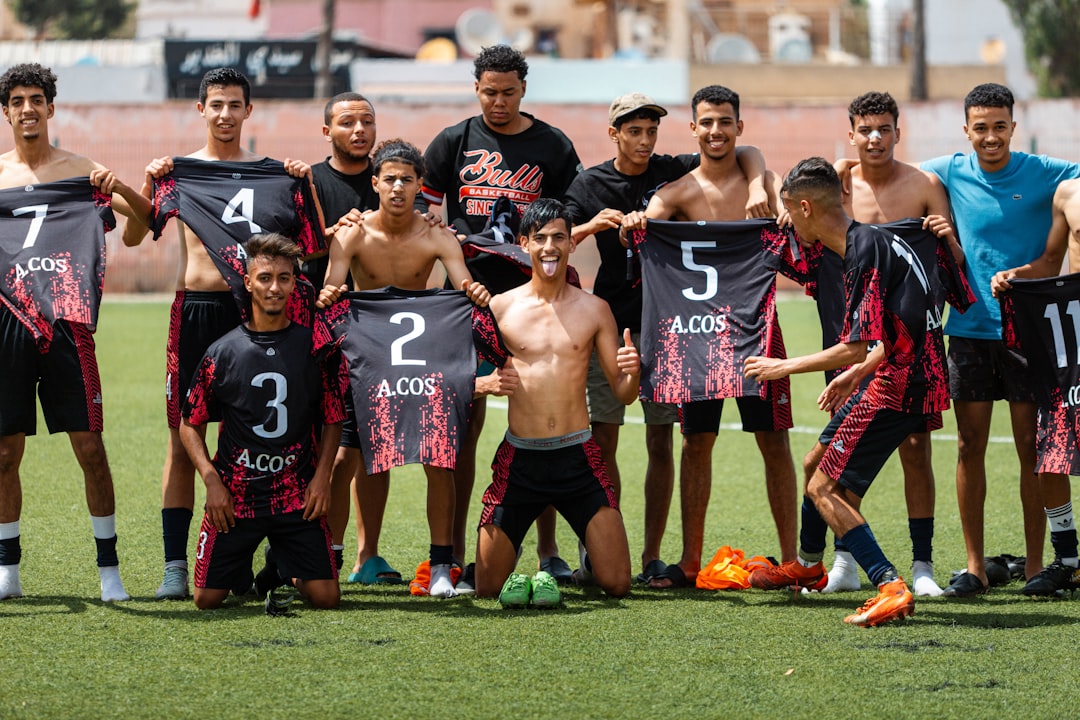 A soccer team poses for a group photo. puebla team, soccer lineup, liga mx match