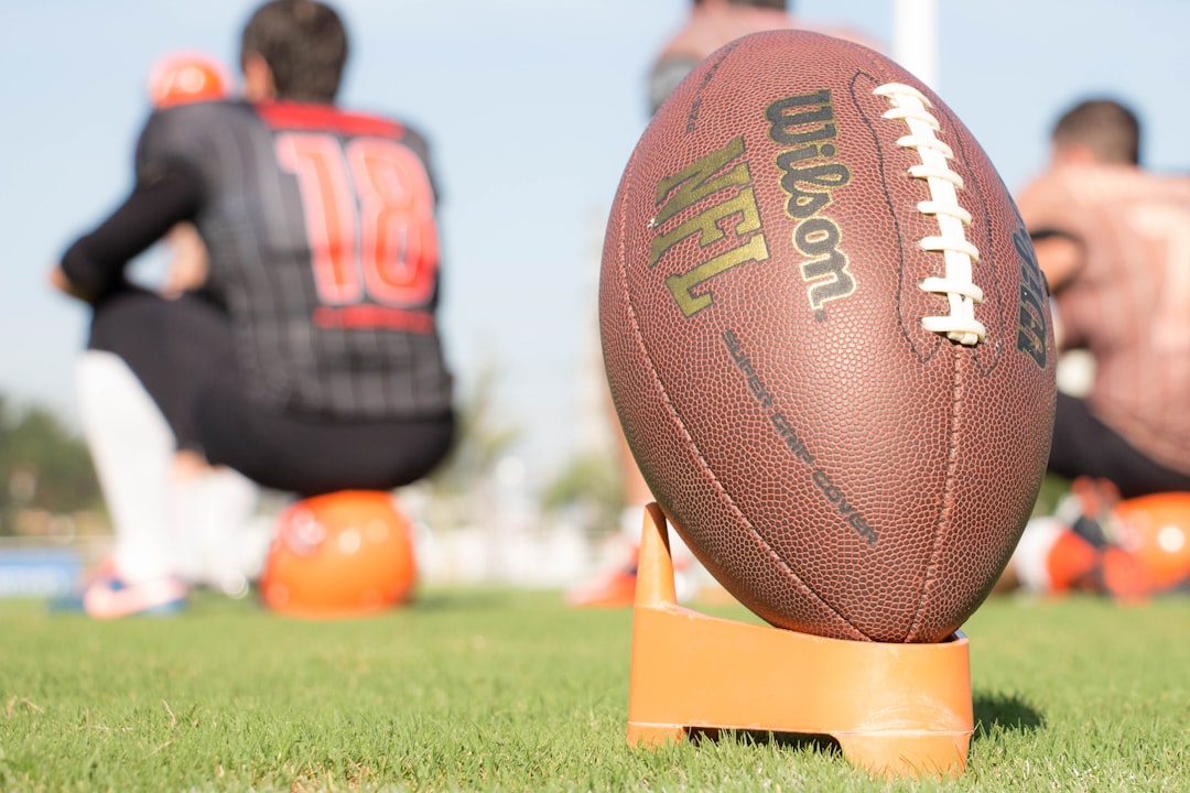 brown Wilson NGL ball nfl players, football roster cuts, athlete tryouts
