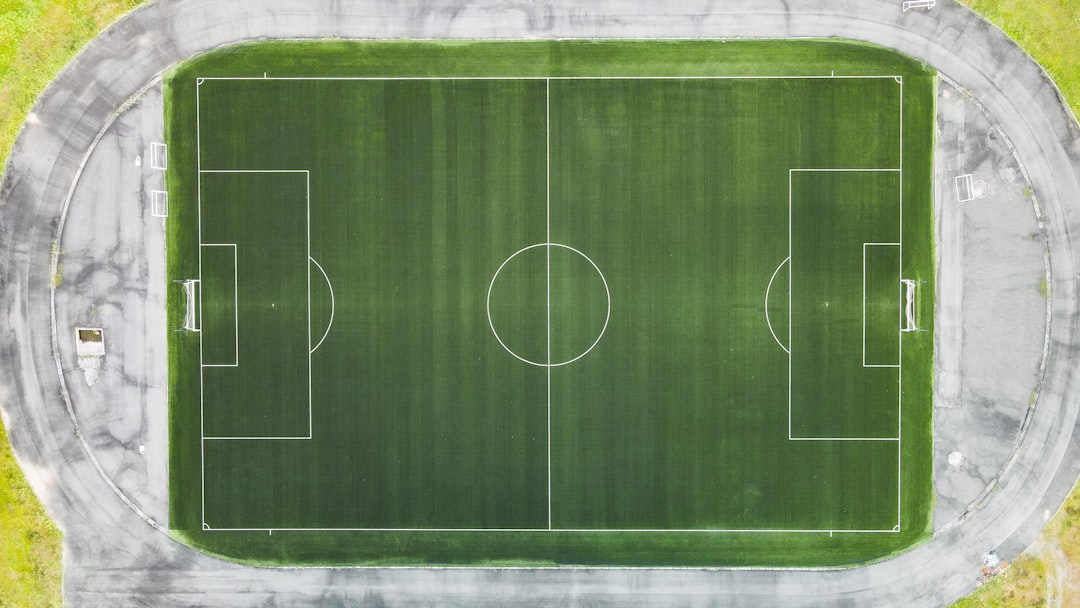 green and white chalk board football scoreboard stats shot goal pass possession