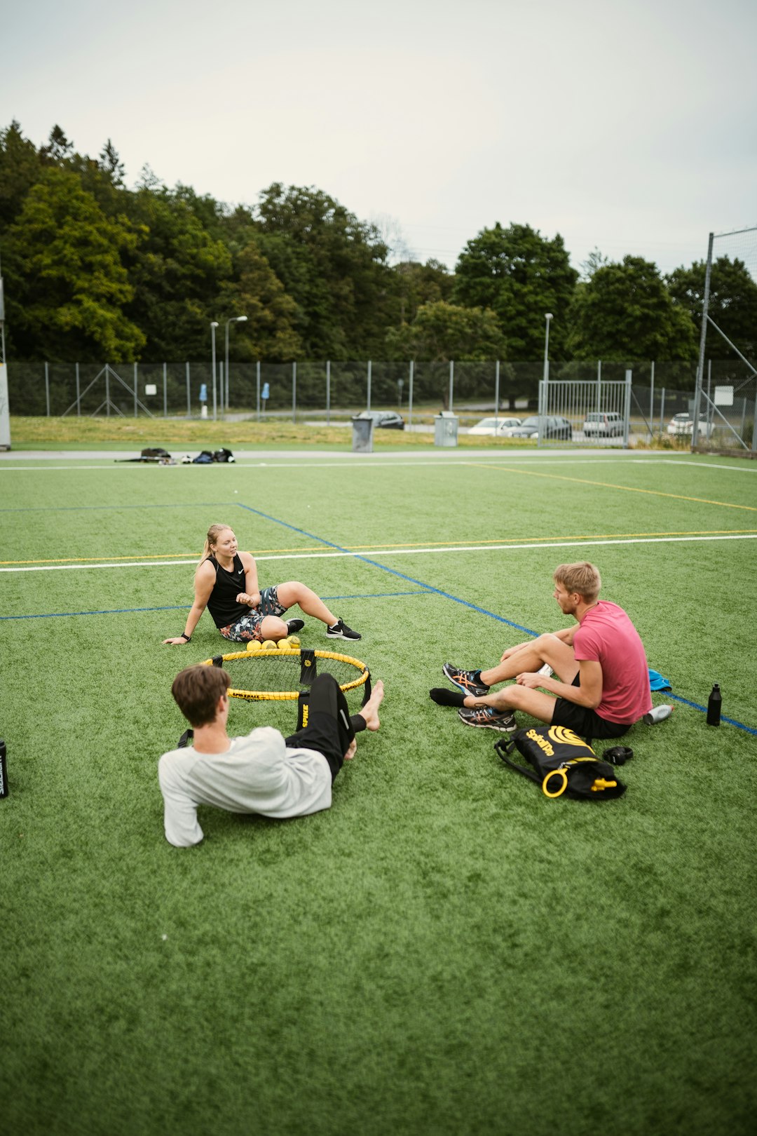 people playing soccer on green grass field during daytime ladder drill, cone drill, speed training, football agility